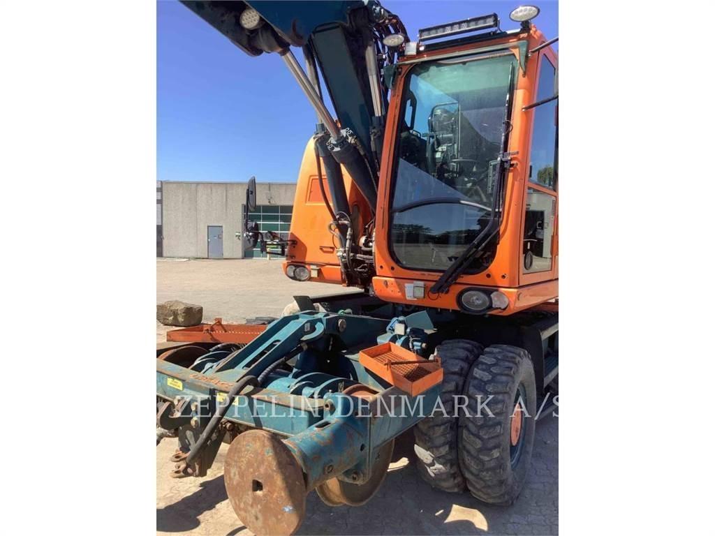 CAT M315DOEM Kolesové rýpadlá