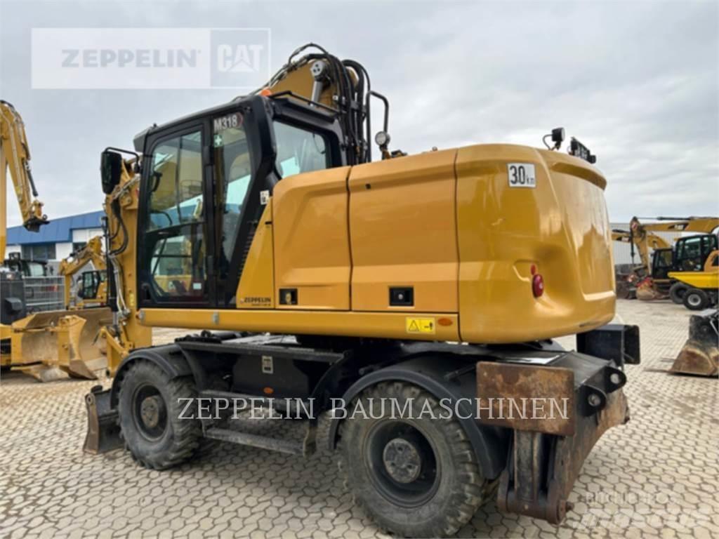 CAT M318-07A Kolesové rýpadlá