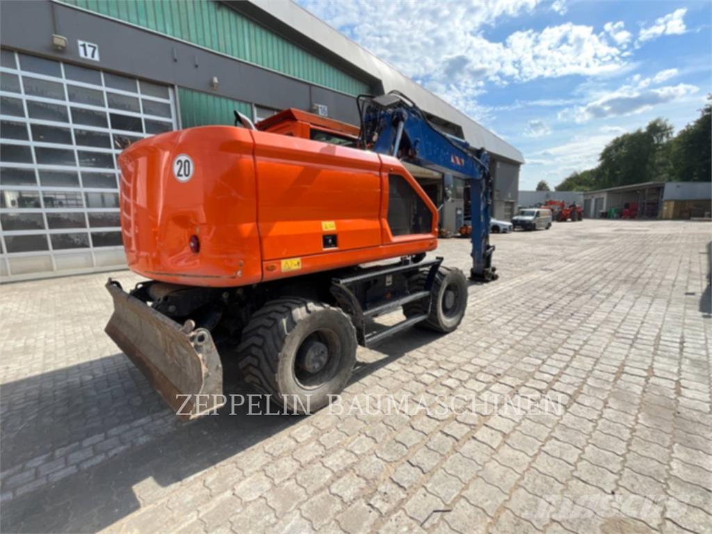 CAT M318-07A Kolesové rýpadlá
