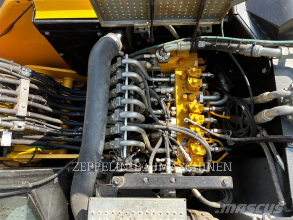 CAT M318F Kolesové rýpadlá