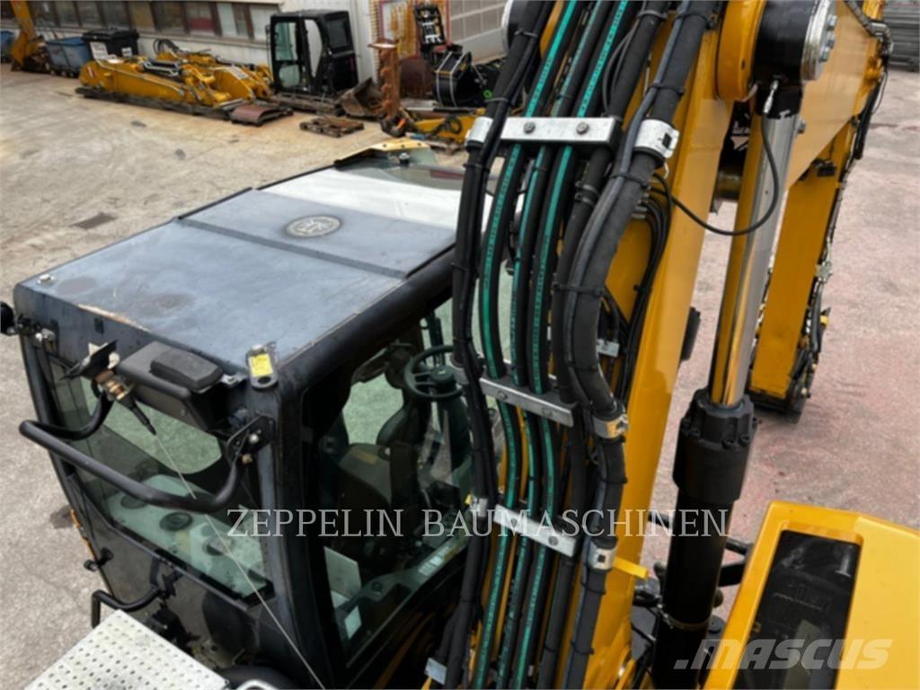 CAT M320F Kolesové rýpadlá
