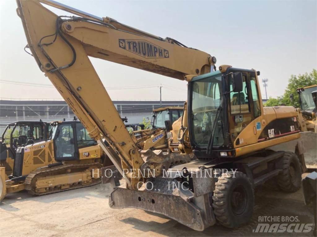 CAT M322C Kolesové rýpadlá