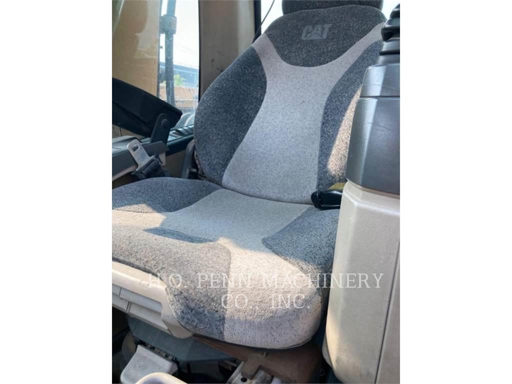 CAT M322C Kolesové rýpadlá