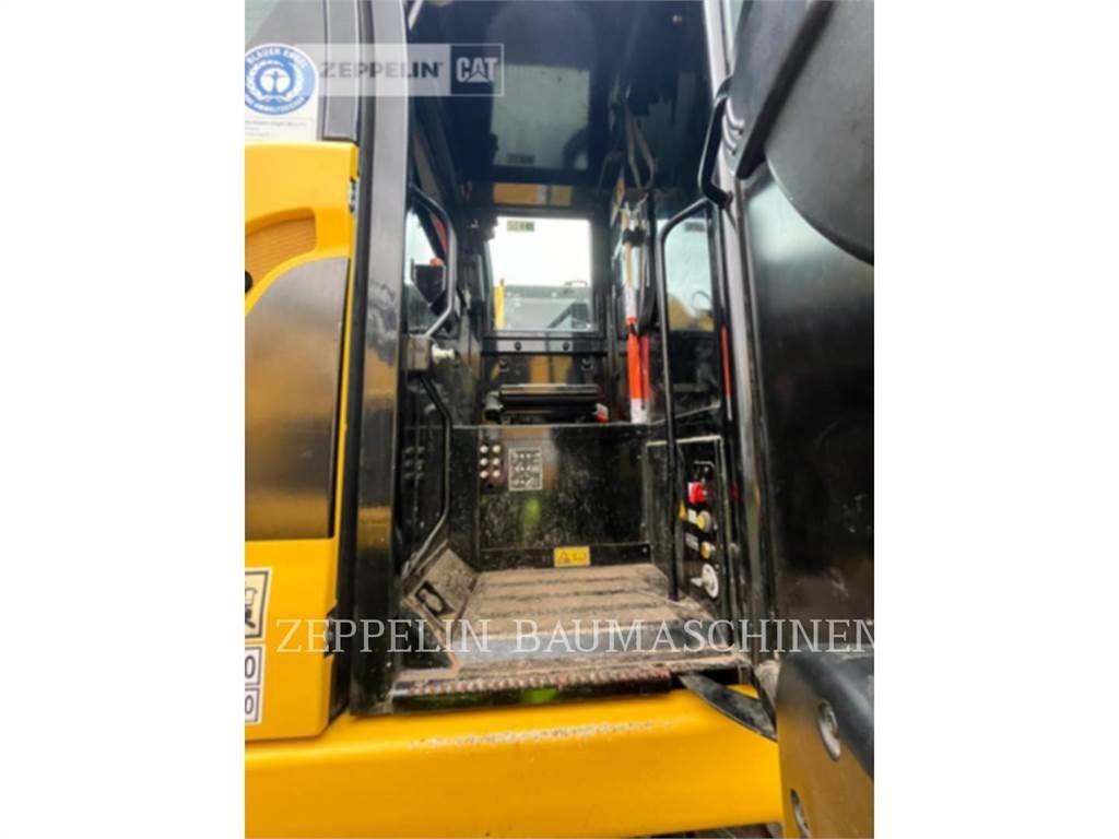 CAT M323F Kolesové rýpadlá