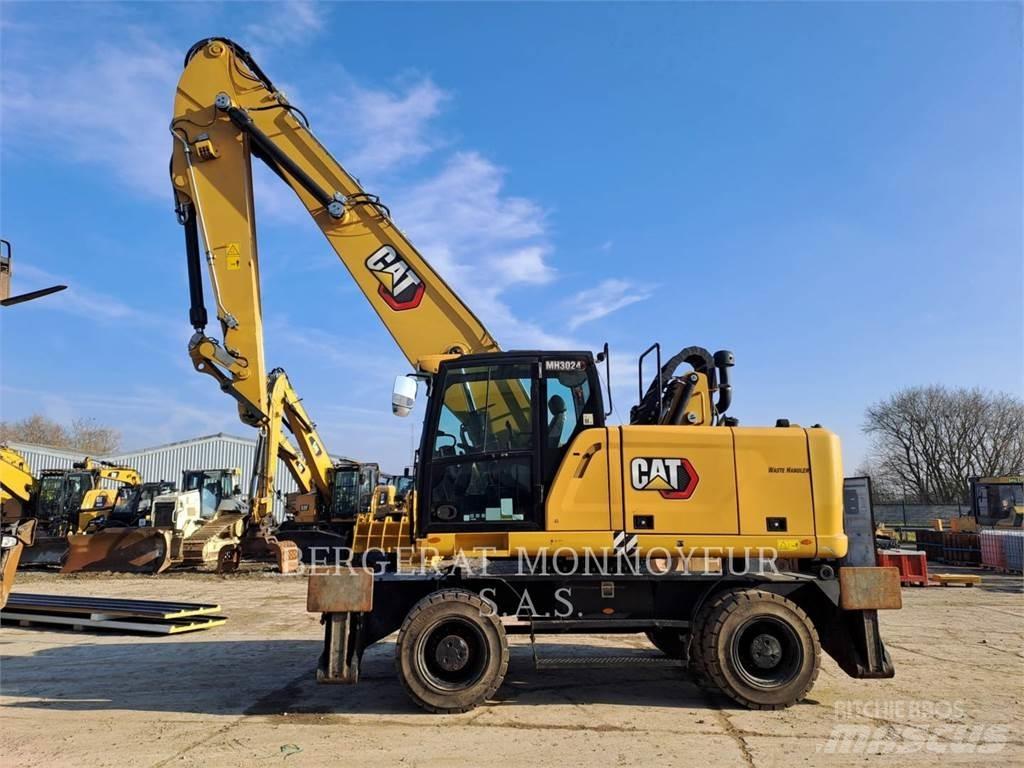 CAT MH3024 Kolesové rýpadlá