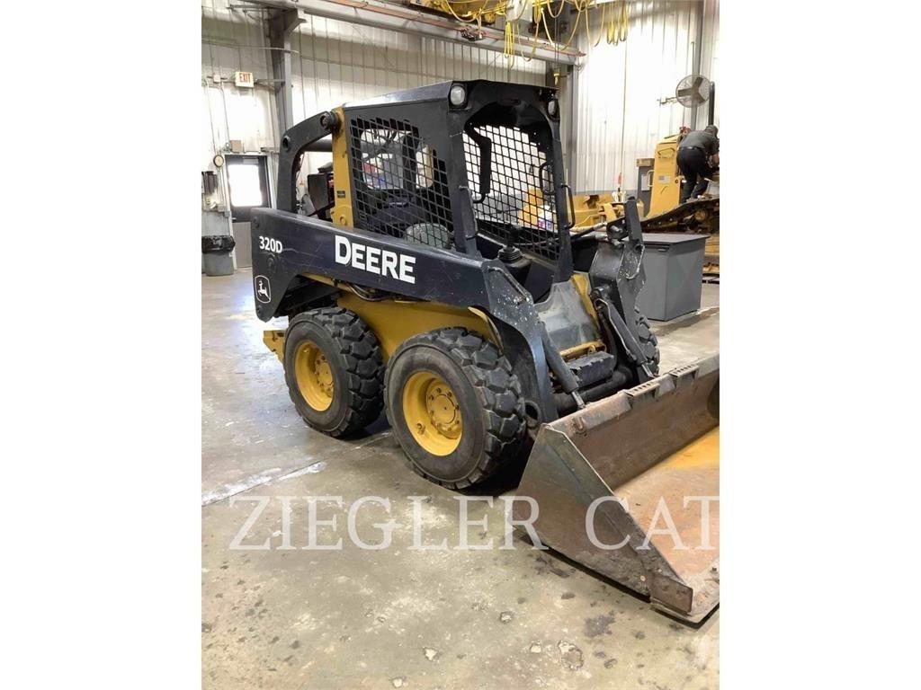 John Deere & CO. 320 D Šmykom riadené nakladače