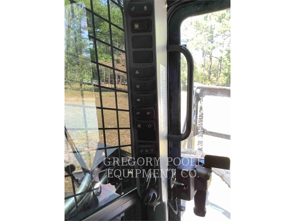 New Holland C345 Pásové nakladače