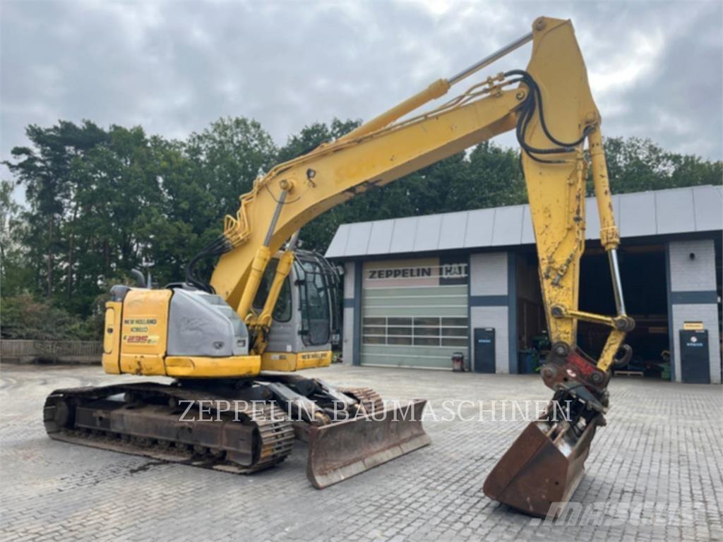 New Holland E235 Pásové rýpadlá