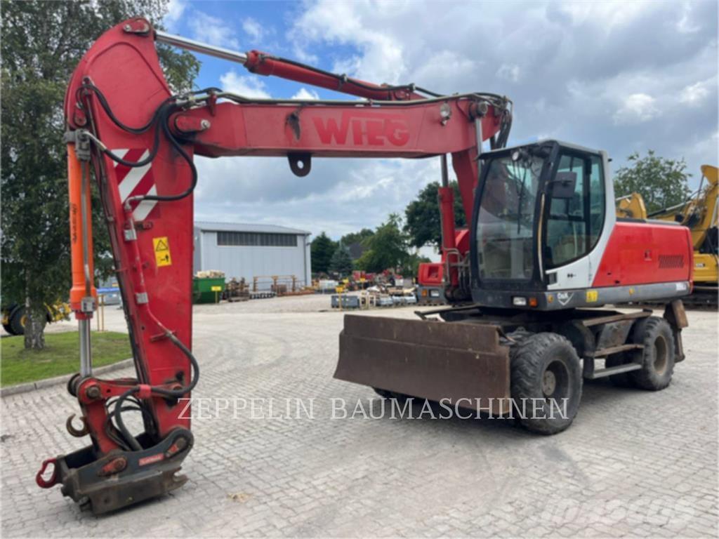O&K MH6.6 Kolesové rýpadlá