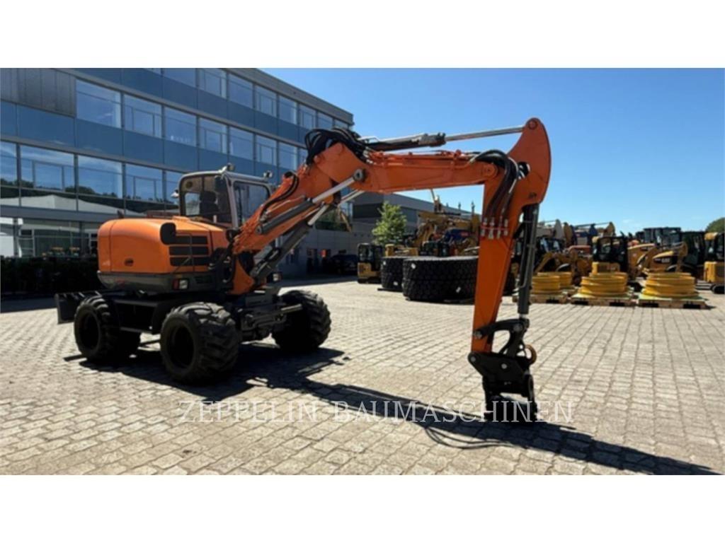 Wacker EW100 Kolesové rýpadlá