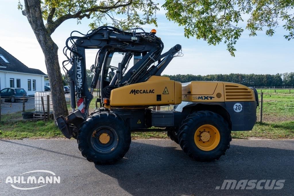 Mecalac 12 MXT Kolesové rýpadlá