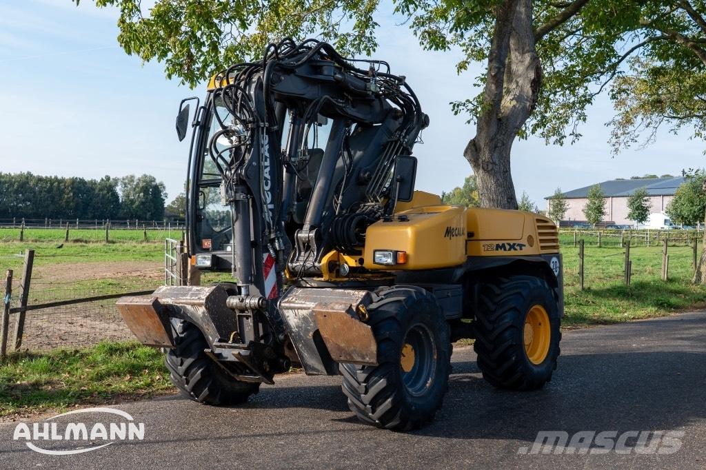 Mecalac 12 MXT Kolesové rýpadlá
