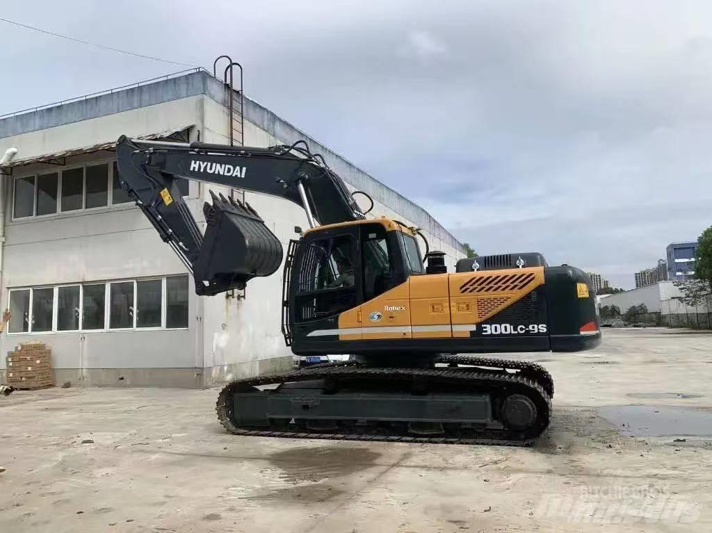 Hyundai 300-9 Pásové rýpadlá