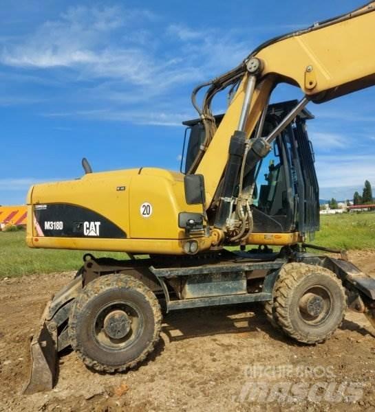 CAT M318 D Kolesové rýpadlá