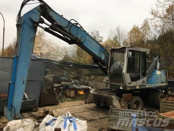 Fuchs MHL 320 Stroje pre manipuláciu s odpadom