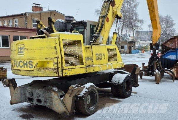 Fuchs MHL 331 Stroje pre manipuláciu s odpadom