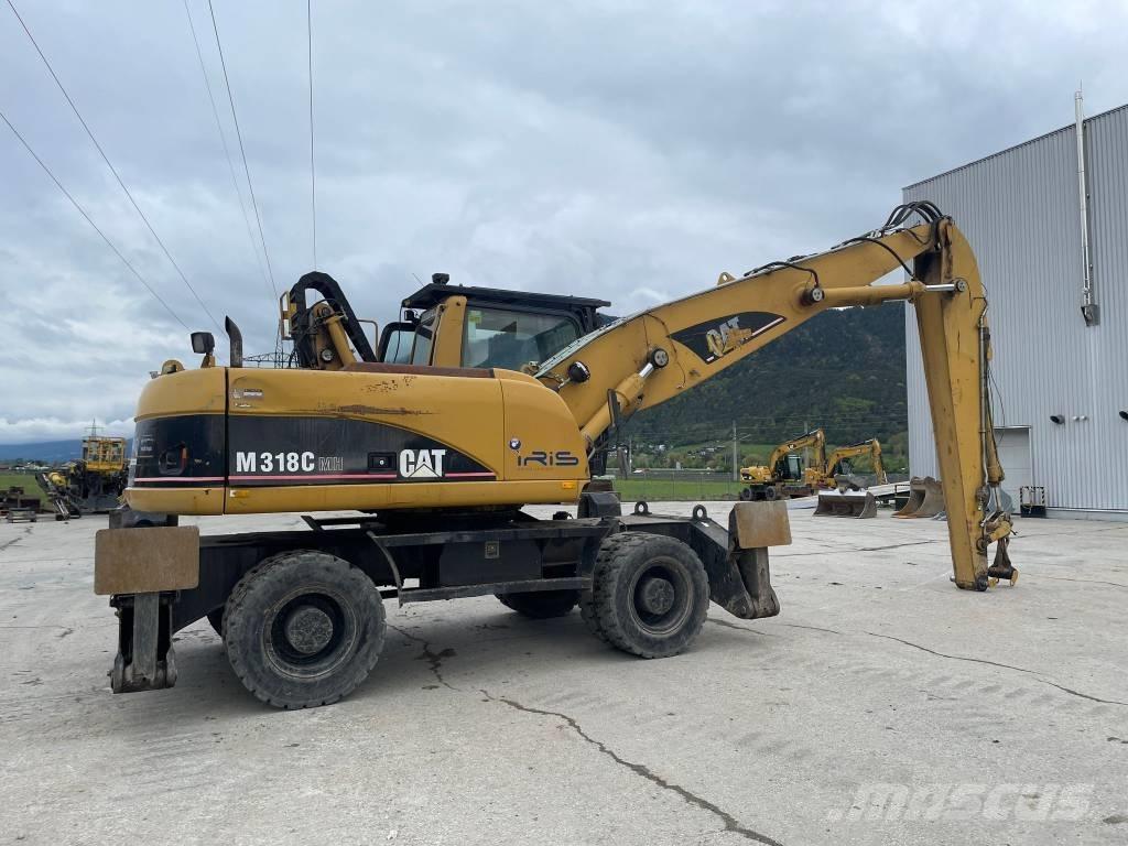 CAT M 318 C MH Stroje pre manipuláciu s odpadom