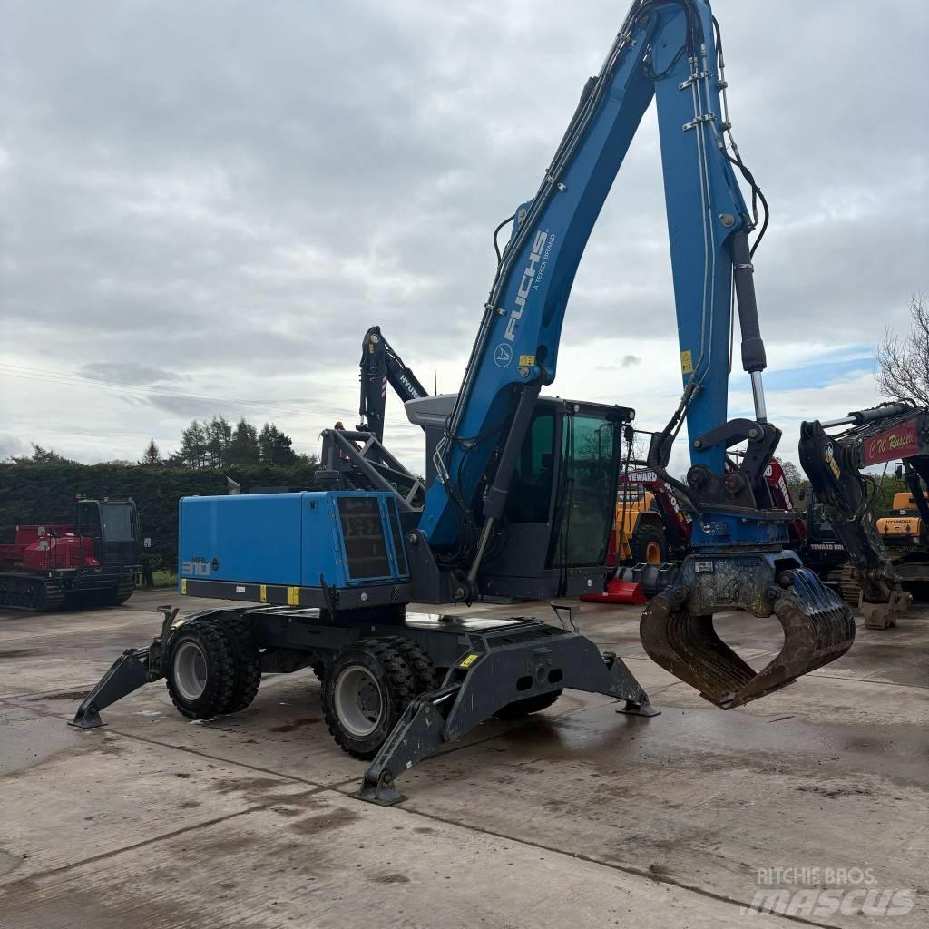 Fuchs MHL 310 Manipulácia s materiálom - ostatné