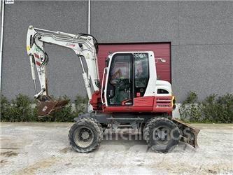 Takeuchi TB295W Kolesové rýpadlá