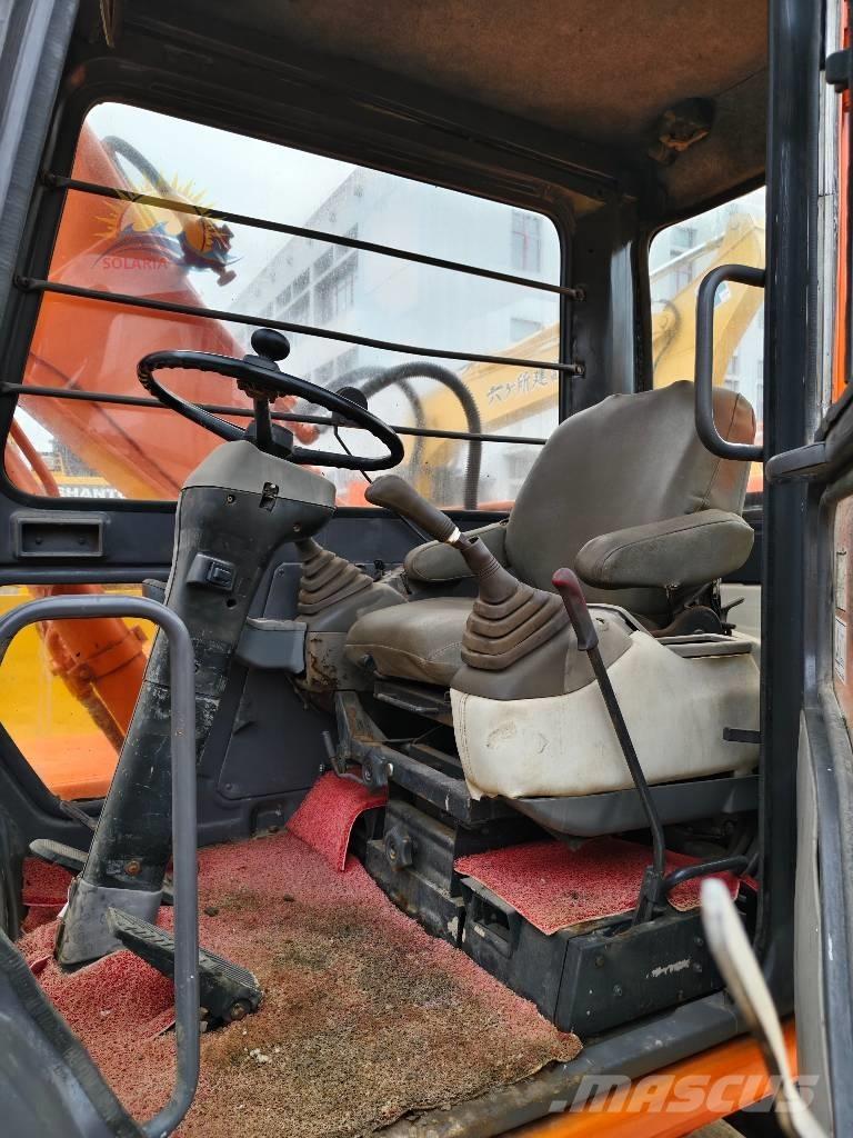 Hitachi EX 100 W D Kolesové rýpadlá