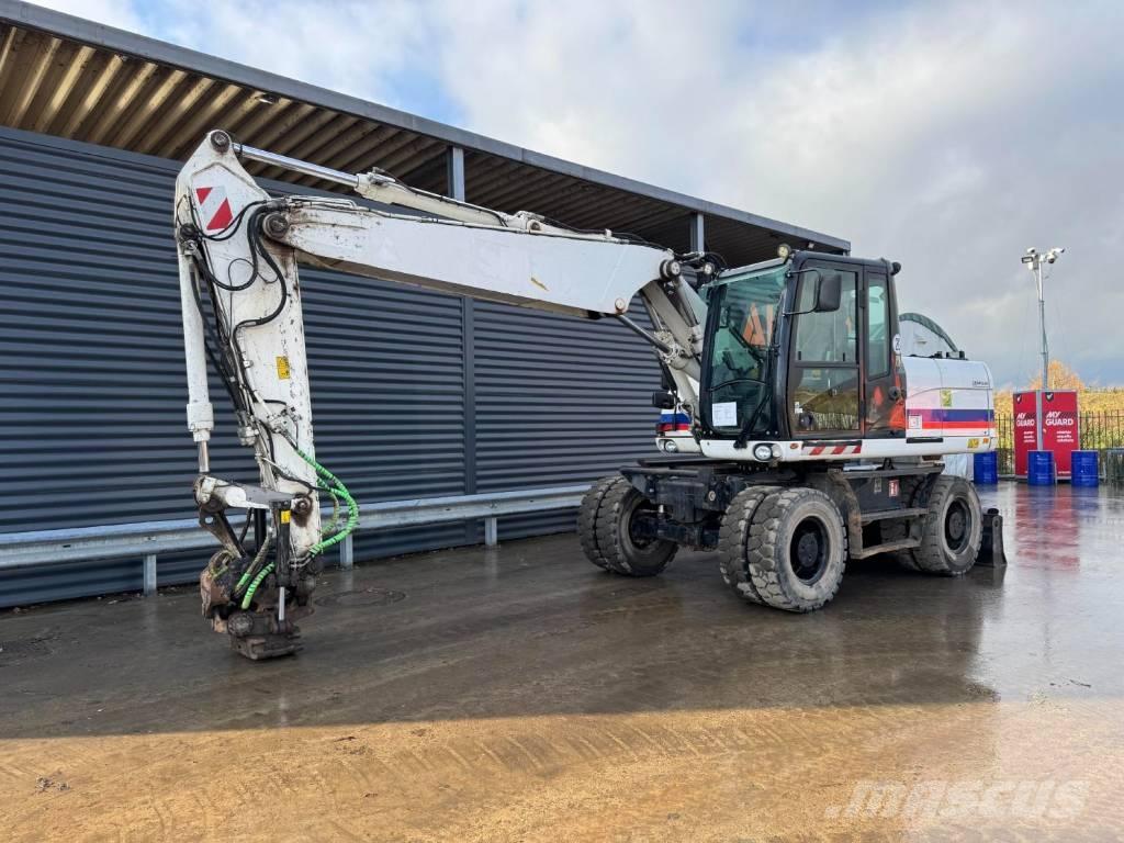 CAT M315D Kolesové rýpadlá