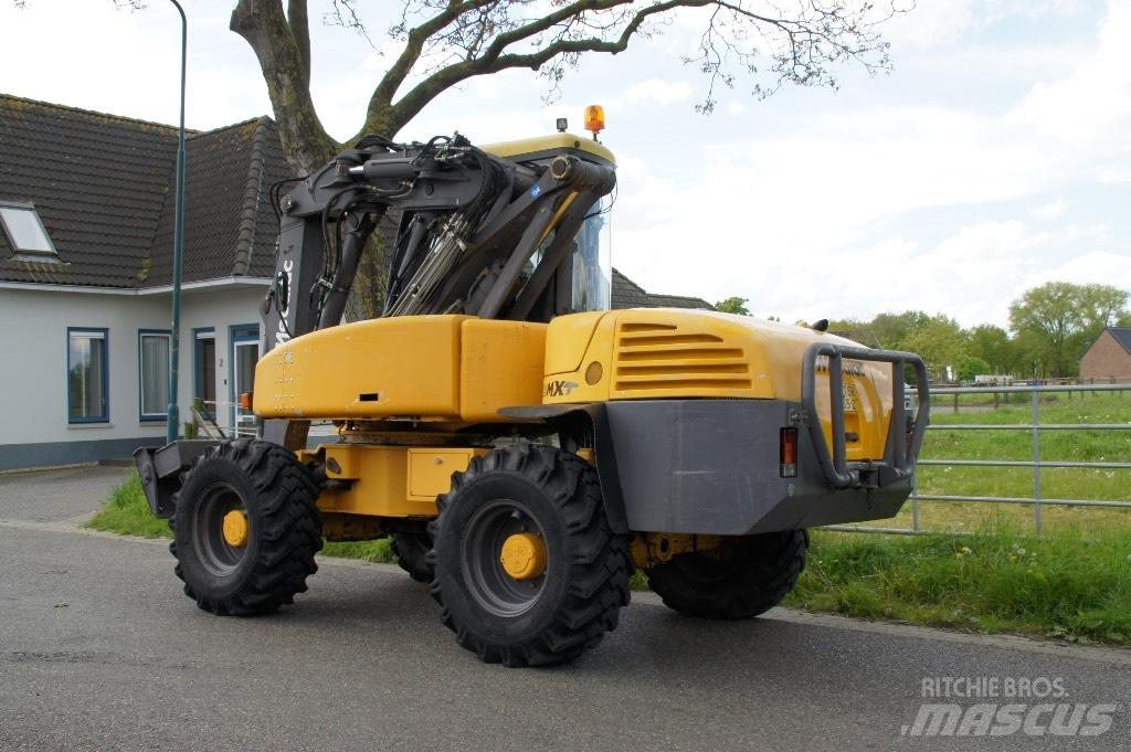 Mecalac 12 MXT Kolesové rýpadlá