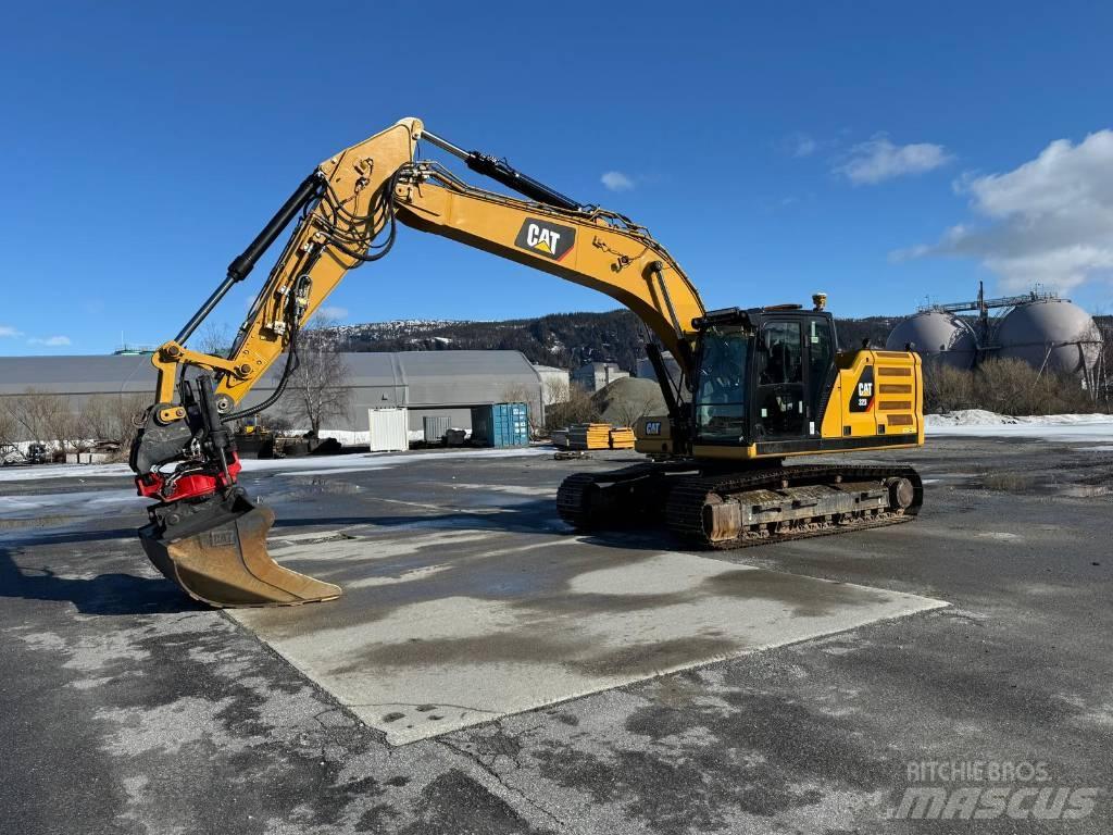 CAT 323 NG Pásové rýpadlá