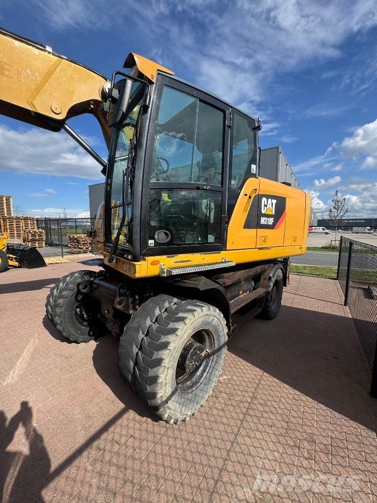CAT 318 Kolesové rýpadlá
