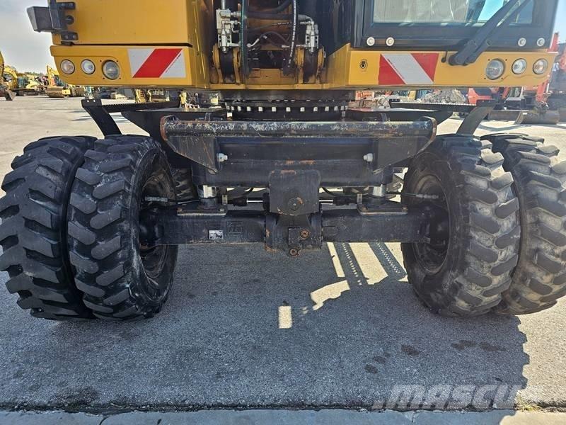 CAT M320F Kolesové rýpadlá
