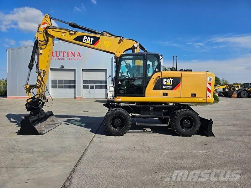 CAT M320F Kolesové rýpadlá