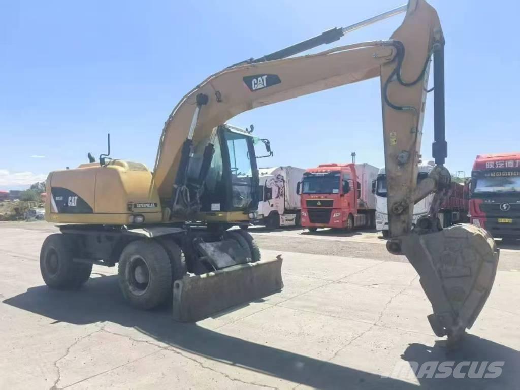 CAT M315D2 Kolesové rýpadlá