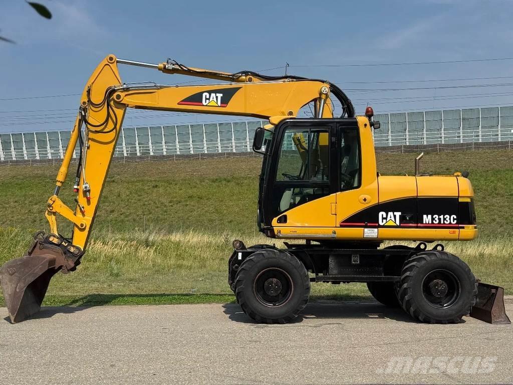 CAT M313C Kolesové rýpadlá