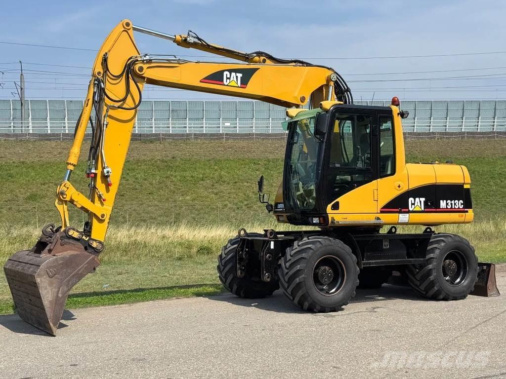 CAT M313C Kolesové rýpadlá