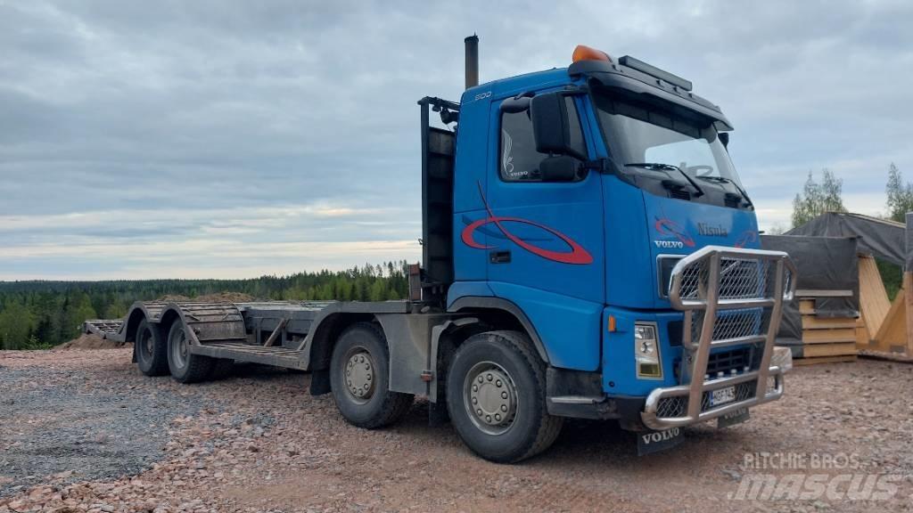 Volvo FH12 8x4 Nákladné automobily na prepravu lesných strojov
