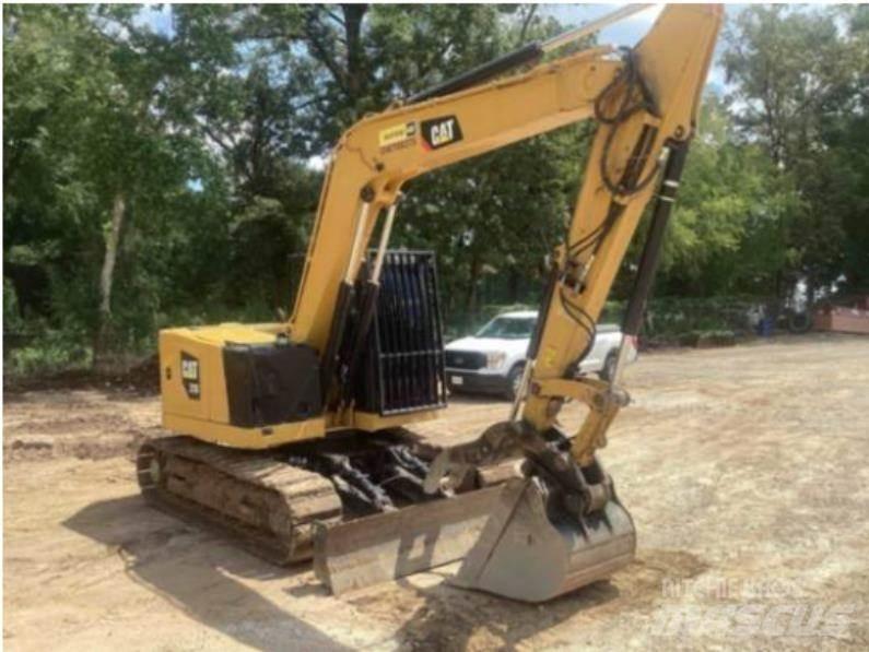CAT 310 Pásové rýpadlá