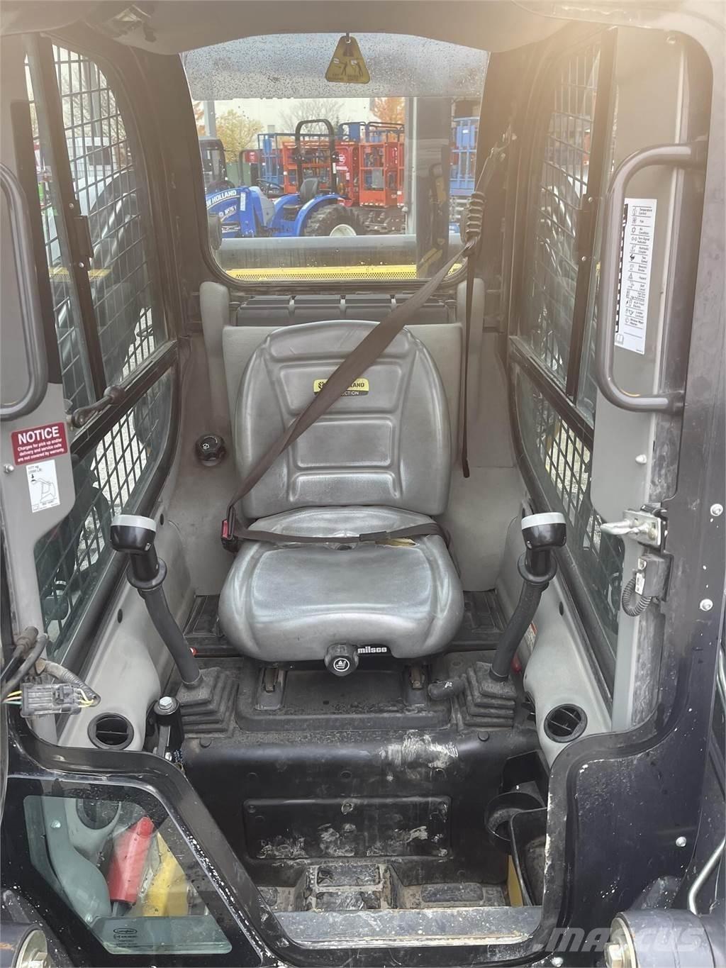 New Holland C237 Šmykom riadené nakladače