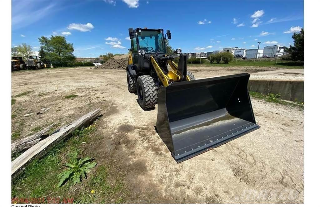 New Holland W80C Kolesové nakladače