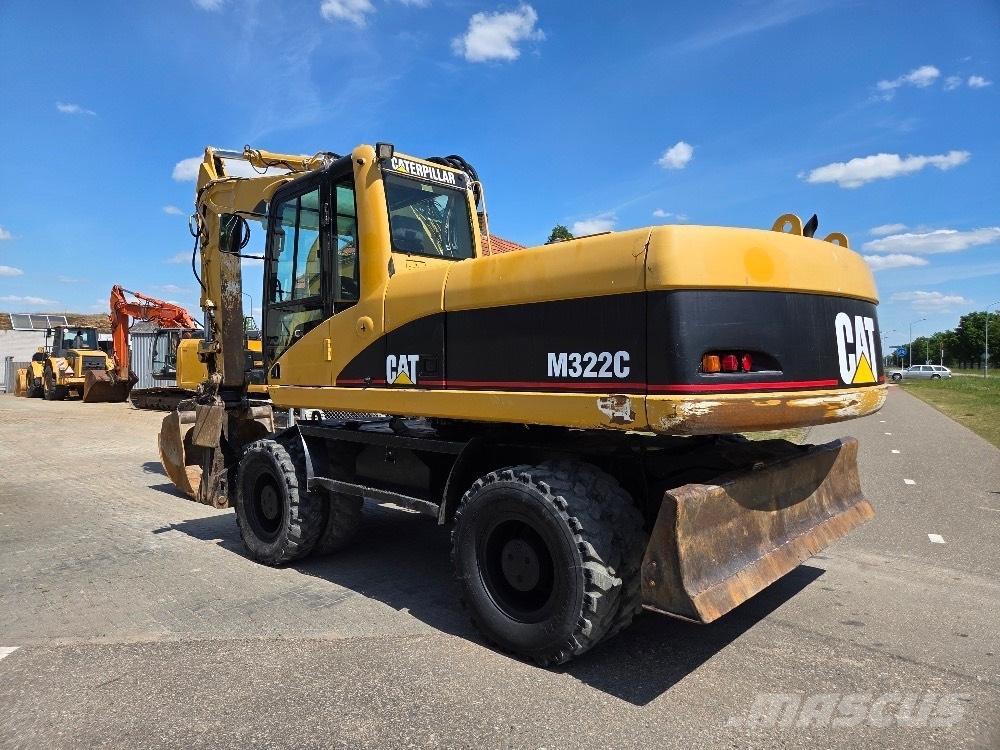 CAT M322C Kolesové rýpadlá
