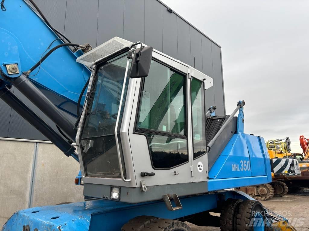 Fuchs MHL350  --  MHL 350 Stroje pre manipuláciu s odpadom