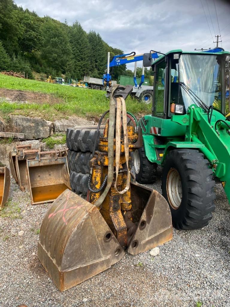 Hitachi ZX 140 W-3 Kolesové rýpadlá