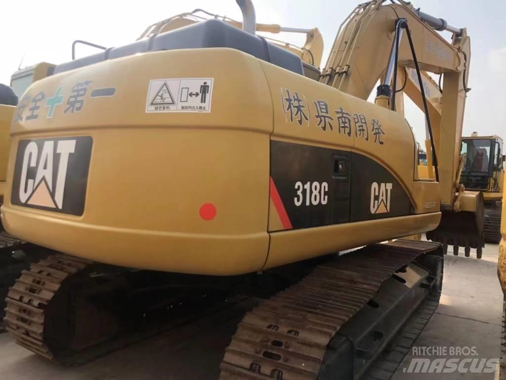 CAT 318C Pásové rýpadlá