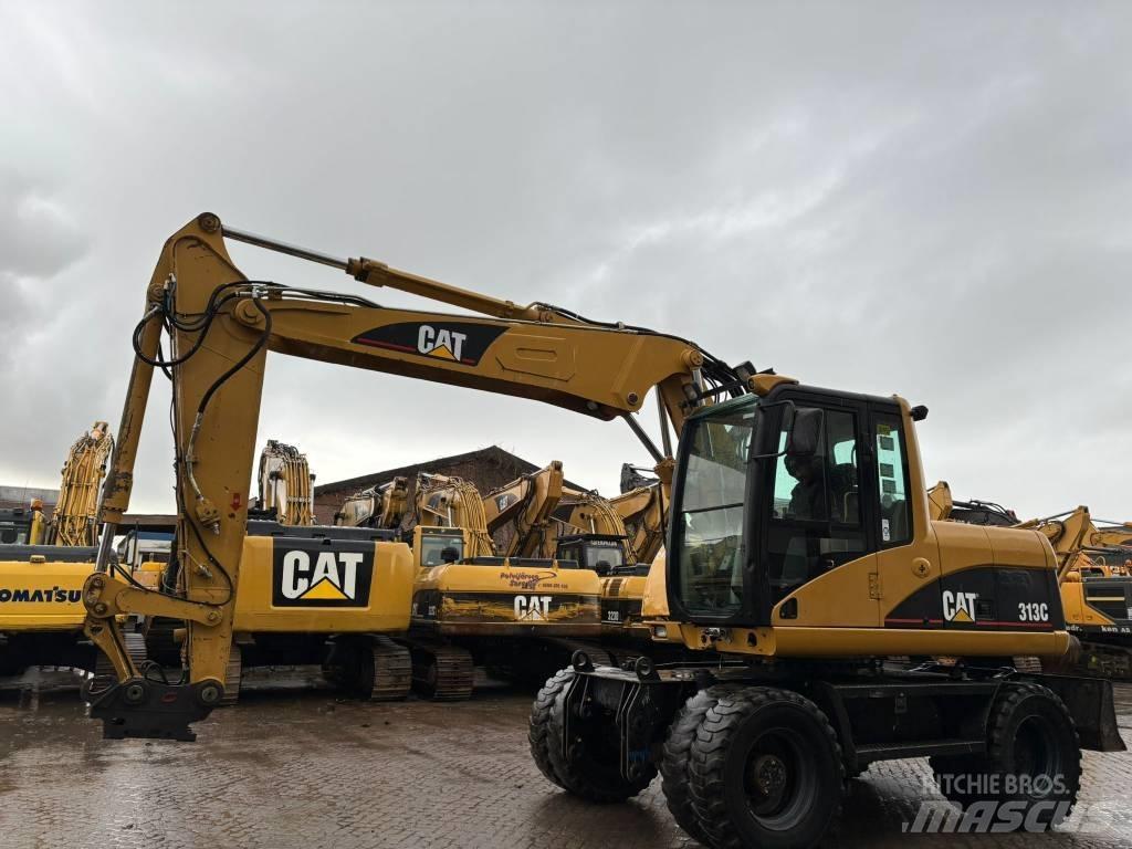 CAT M 313 C Kolesové rýpadlá
