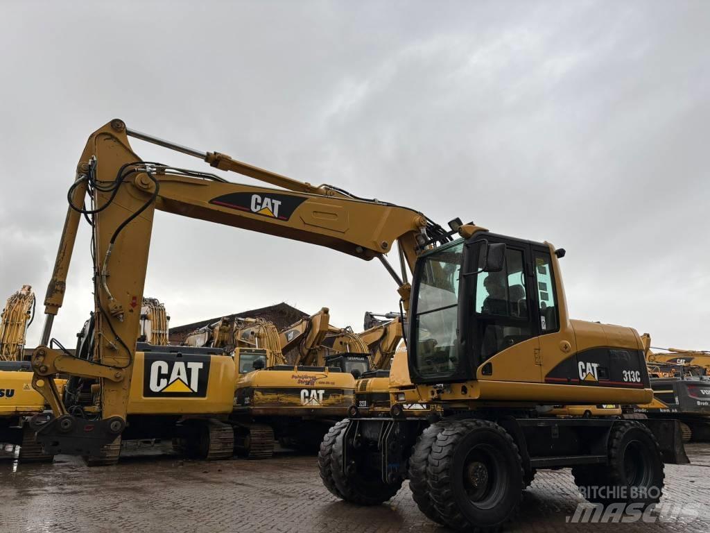 CAT M 313 C Kolesové rýpadlá
