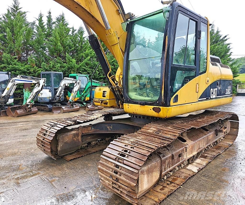 CAT 318 C Pásové rýpadlá