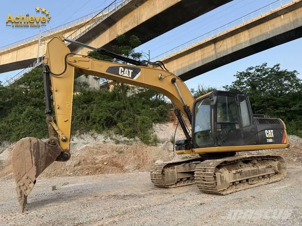 CAT 318DL Pásové rýpadlá