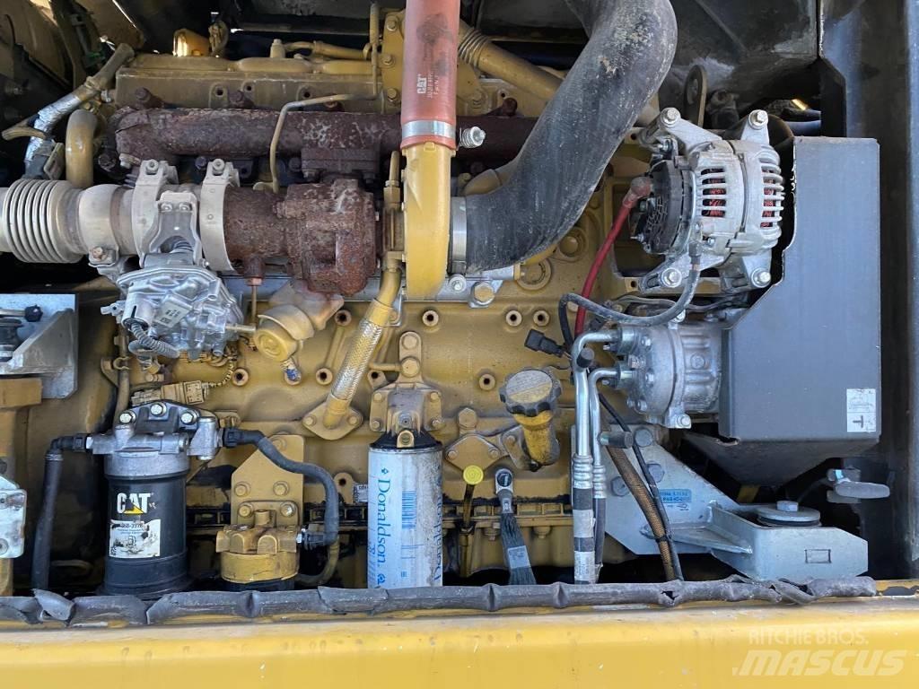 CAT MH3022 Stroje pre manipuláciu s odpadom