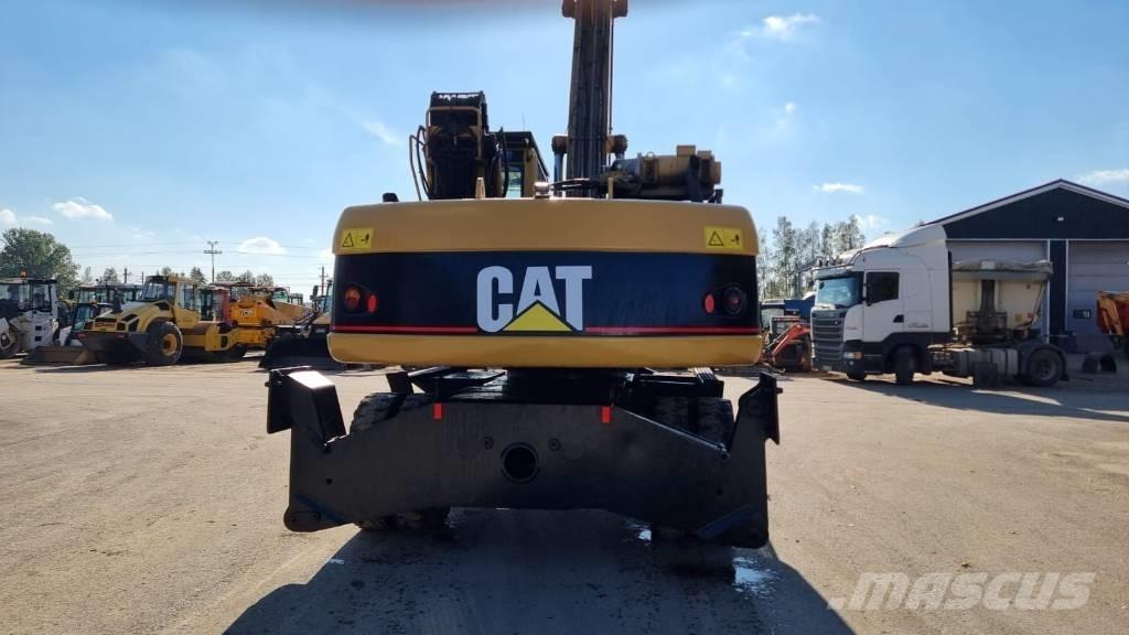 CAT M 322 C MH Stroje pre manipuláciu s odpadom