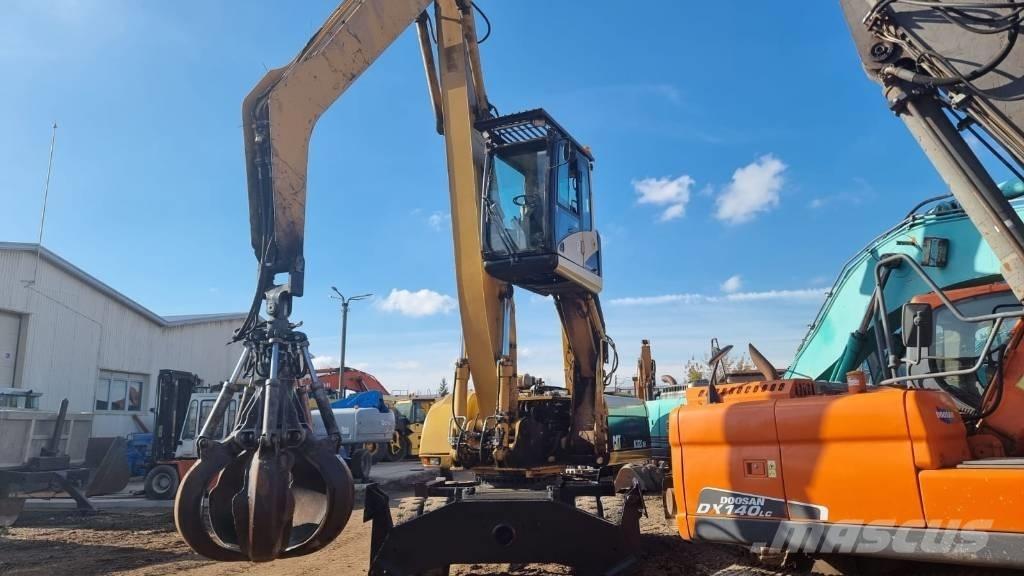 CAT M 322 C MH Stroje pre manipuláciu s odpadom