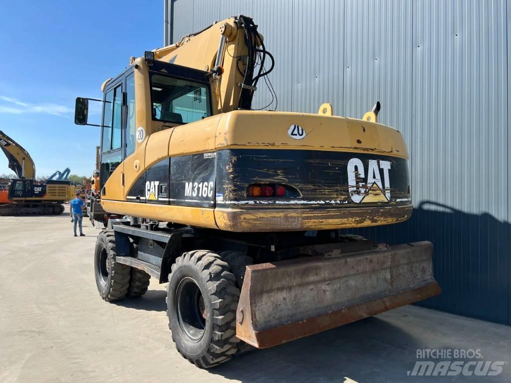 CAT M316C Kolesové rýpadlá