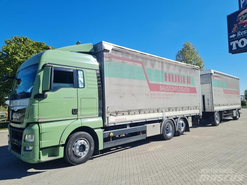 MAN 26.440  7.4 + 7.3 Nákladné vozidlá s bočnou zhrnovacou plachtou